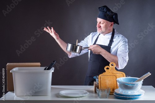 Chef man in restaurant kitc...