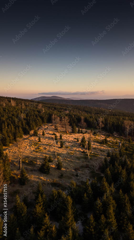 Fototapeta premium Owl Mountains poland - sunset in the mountains - drone highquality - Sudetes