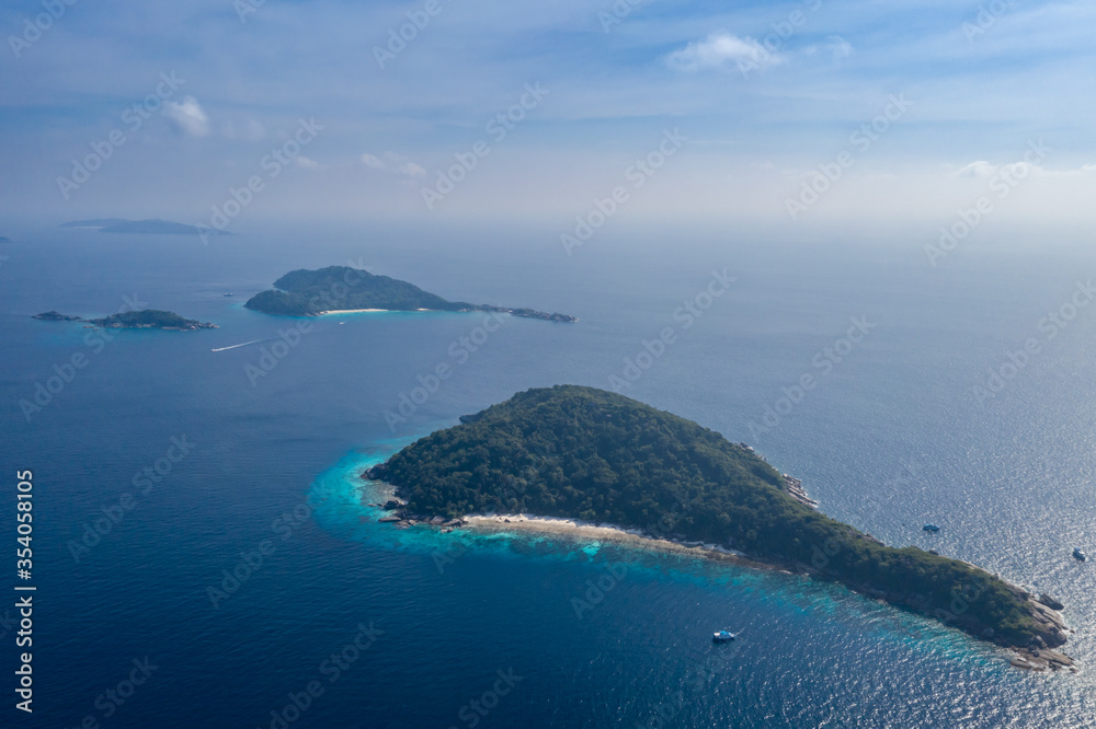 Aerial view on beautiful tropical island with white sand beach, turquoise water and granite stones. Similan Islands, Thailand.