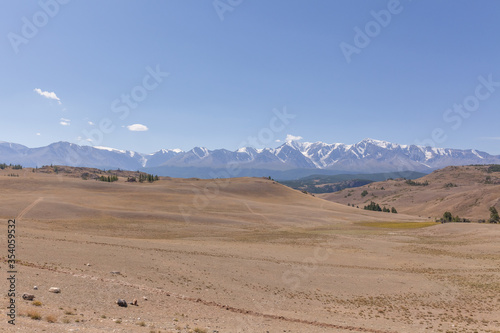 View of Belukha Mountain. Russia. Snow mountains of Altai. Belukha the highest peak of Siberia