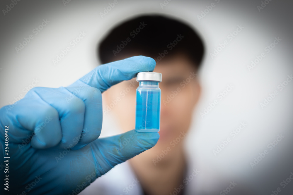 Scientists or doctors collect viral samples for preparation analysis and production of vaccines in the laboratory , Vaccine research to eliminate viruses concept. Scientists or doctors collect viral samples for preparation analysis and production of vaccines in the laboratory , Vaccine research to eliminate viruses concept.