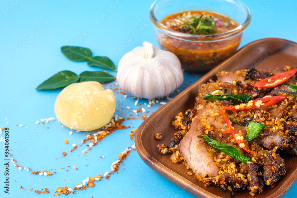 Deep Fried Pork mix spicy thai herbs with spicy dipping, Savory Snack Menu or Thai Food Deep Fried Pork mix spicy thai herbs with spicy dipping, Savory Snack Menu or Thai Food