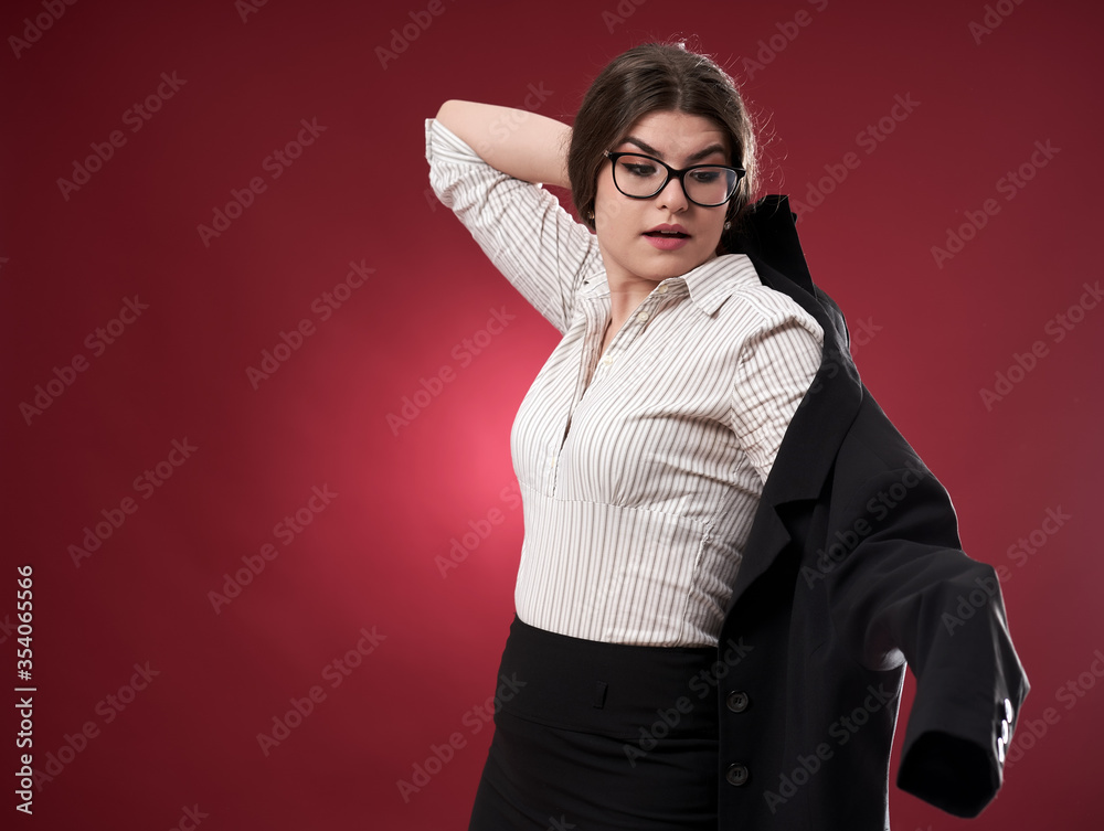 Attractive businesswoman on red background Attractive businesswoman on red background