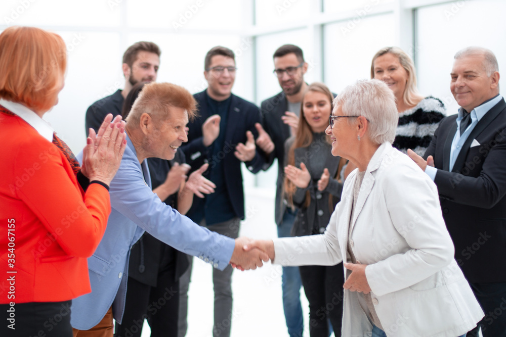 Successful business people group standing in the office Successful business people group standing in the office