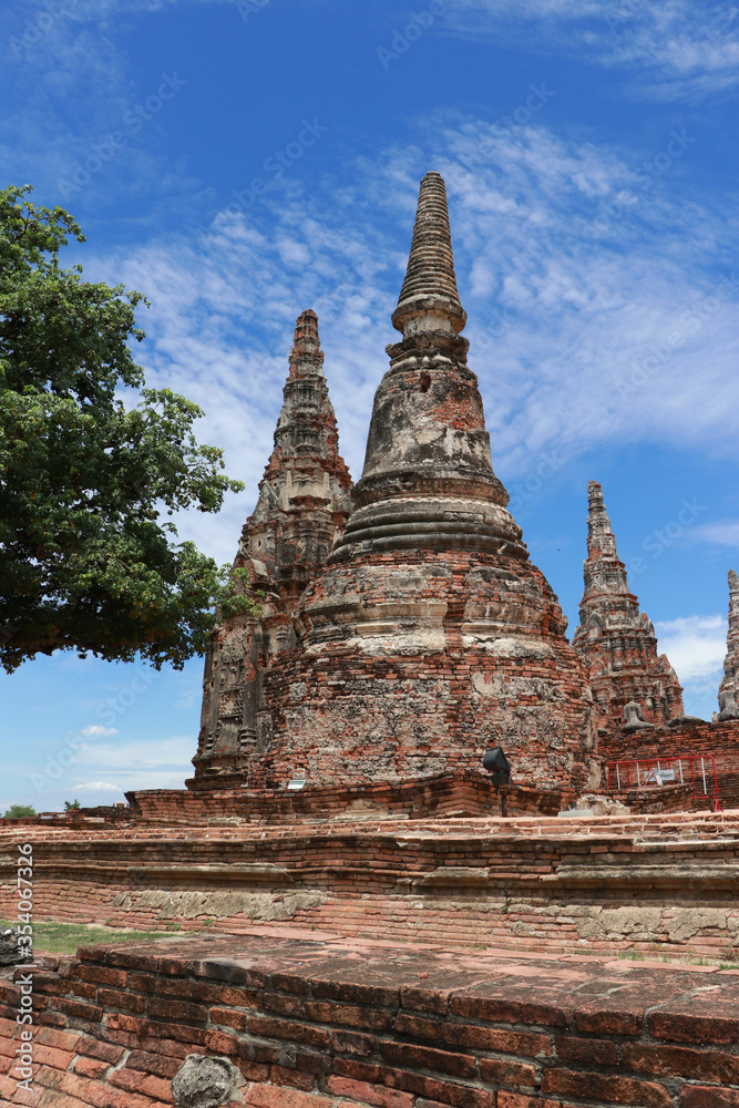Pagodas on blue sky background in the Chaiwatthanaram (Prosperity of victory) Temple Ayutthaya, Thailand.