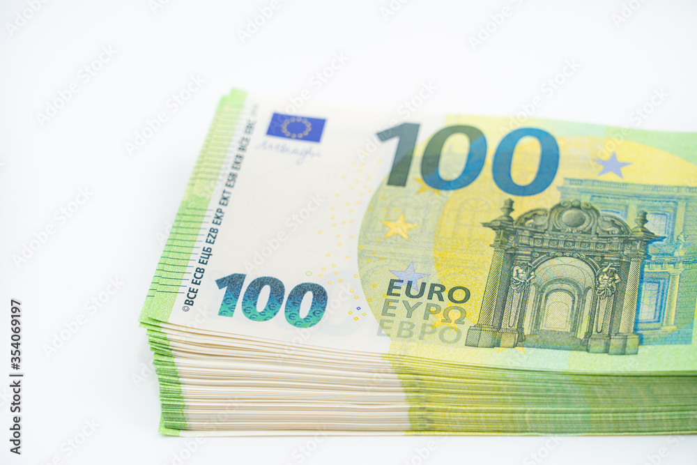 A pack of notes 100 hundred euros. European currency. On white background. Part of a batch of money. Blank for designers. A pack of notes 100 hundred euros. European currency. On white background. Part of a batch of money. Blank for designers.
