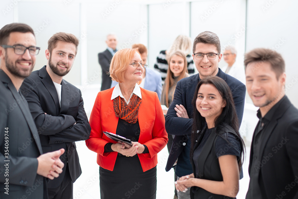 Group of successful business people in the office Group of successful business people in the office