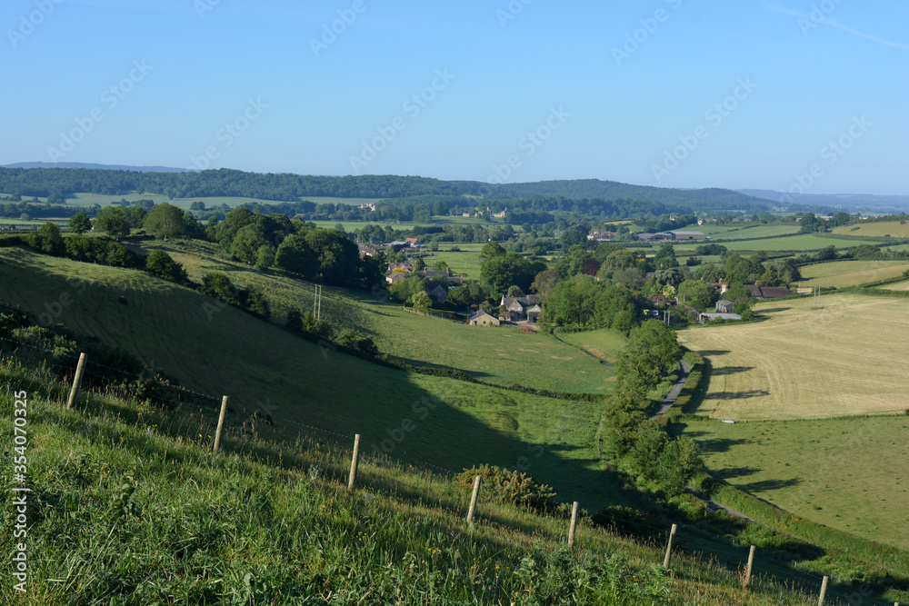 View over typical Dorset countryside with green rolling farmlands in early summer, Oborne, England