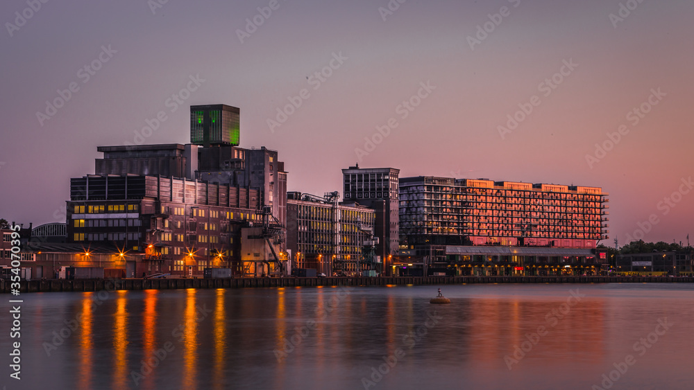 Sunset lights over Rotterdam city