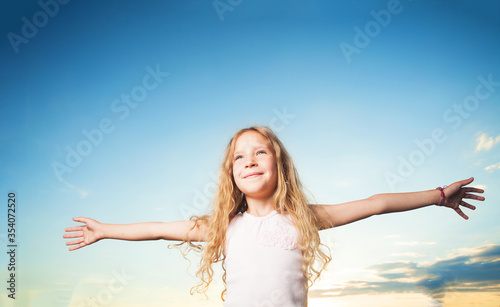 Child with arms outstretched