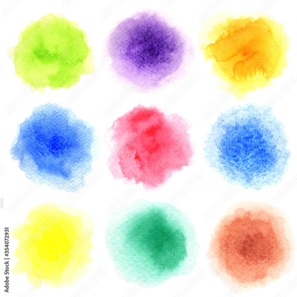 Nine watercolor painted in circle shape on a white rough watercolor paper. Nine colors isolated on white background.