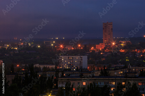 A night city in eastern Europe. On the outskirts of the city  an ore mine