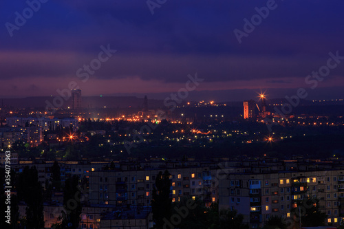 A night city in eastern Europe. On the outskirts of the city, an ore mine