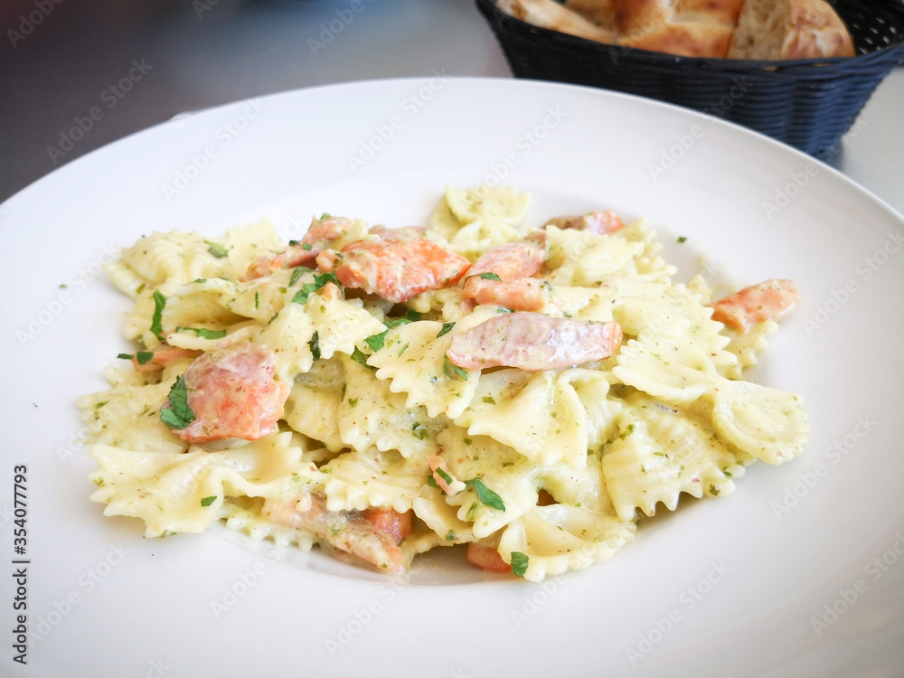 tasty pasta with salmon on a the table