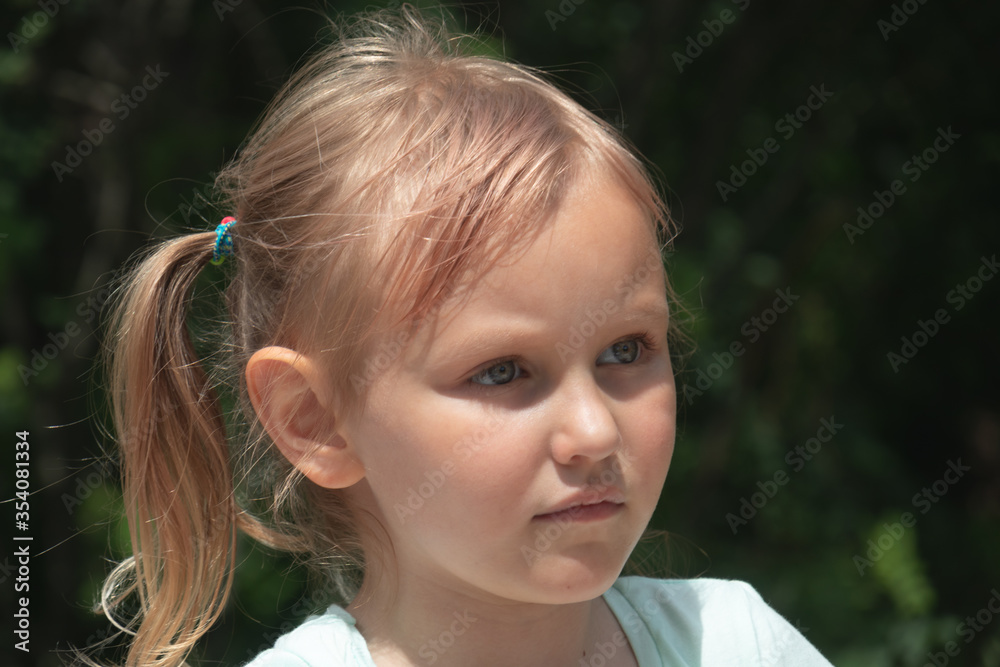 Girl, child 5 years old blonde, European, charming, baby, cute, cheerful, portrait.