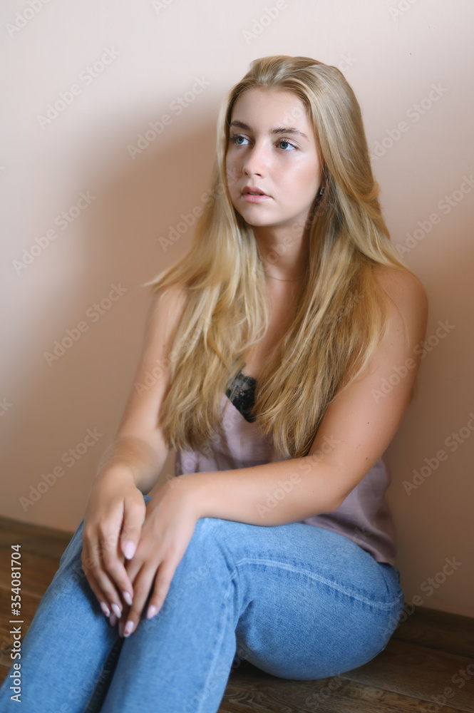 Portrait of beautiful sensual woman with blue eyes. Studio shot. Portrait of beautiful sensual woman with blue eyes. Studio shot.