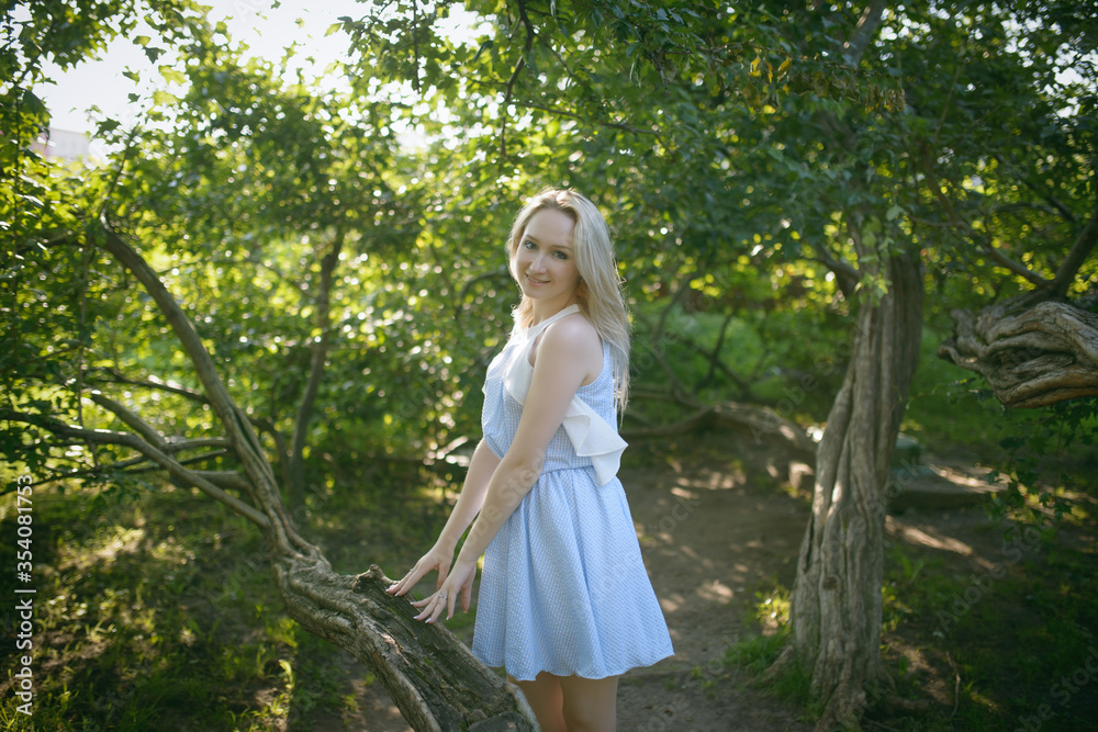Outdoors portrait of beautiful young woman. Selective focus. Outdoors portrait of beautiful young woman. Selective focus.
