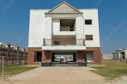 front view of New built of building, sonipat, haryana, july 2019 photo