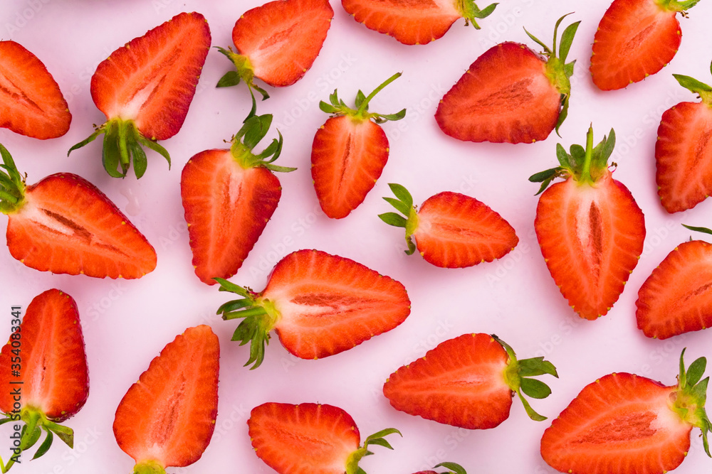 Strawberry slices on a white background flat lay. Food background. Strawberry slices on a white background flat lay. Food background.