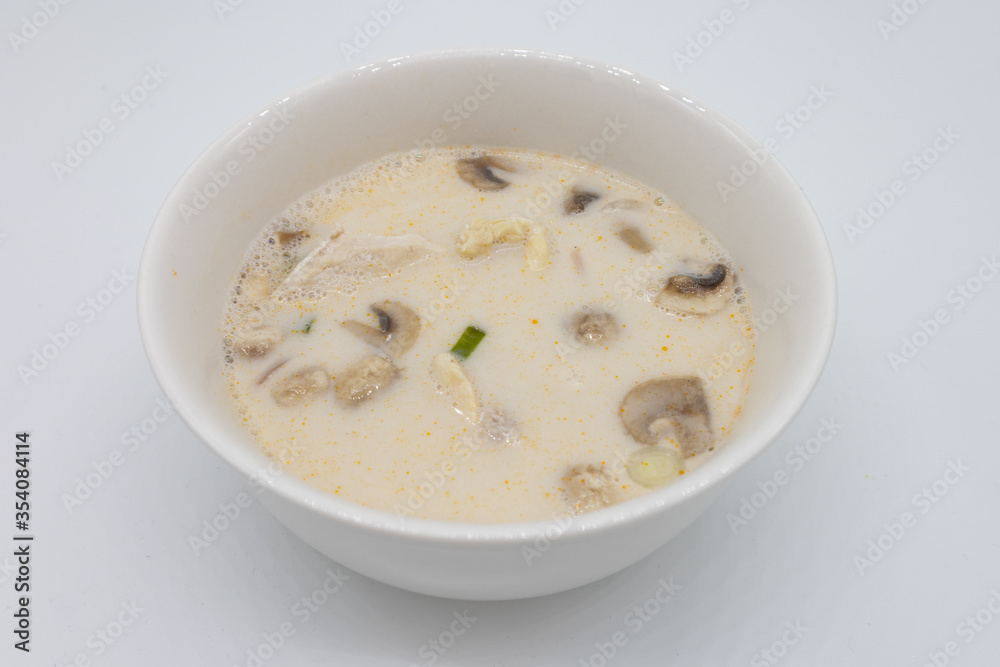 Tom Kha Kai Coconut Thai Soup with a White Background Tom Kha Kai Coconut Thai Soup with a White Background
