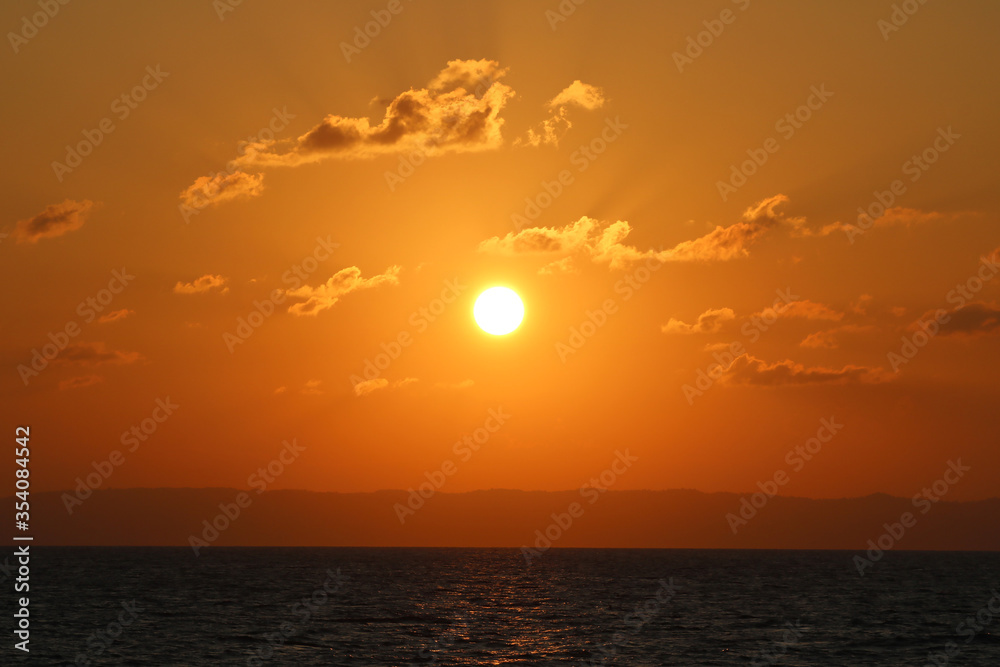 Sunset sky from a ship in ocean. Sunset sky from a ship in ocean.