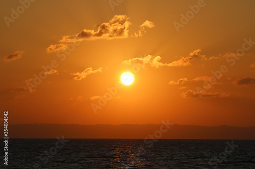 Sunset sky from a ship in ocean. 