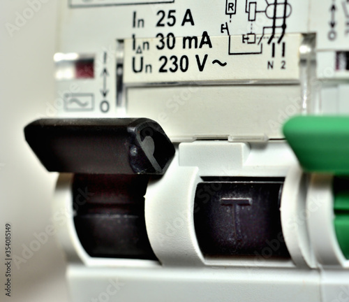 Detail of switches of modern circuit breakers - residual current device and differential switch with test buttons.