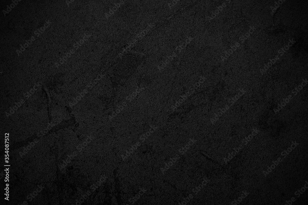 Naklejka premium Black abstract background. Dark texture of rough surface.