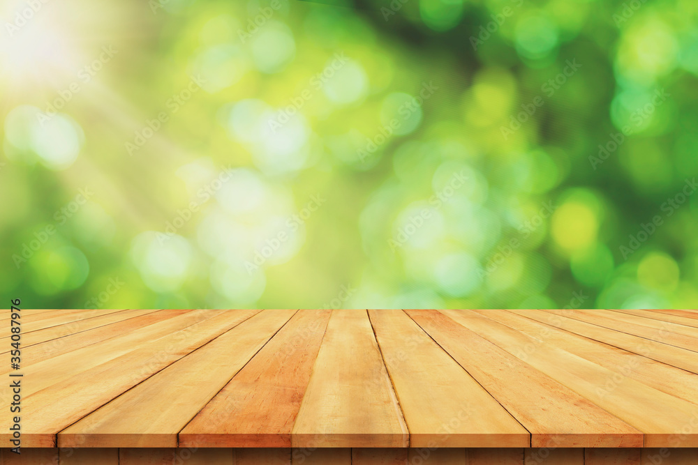 Wood flooring and sunlight and bokeh from leaves Wood flooring and sunlight and bokeh from leaves