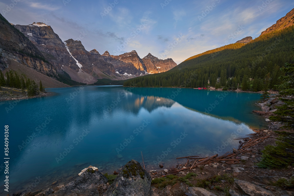 Perfect reflection with shoreline at Moraine Lake in Canada