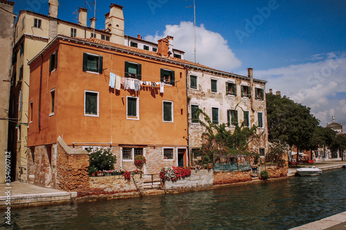traditional colorful house on the water canals in Venice. High quality photo
