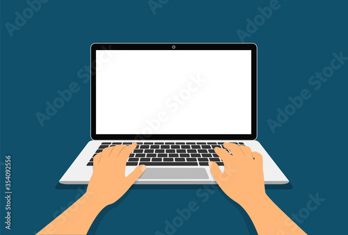 Hands on a laptop keyboard. The concept of working at a laptop top view.