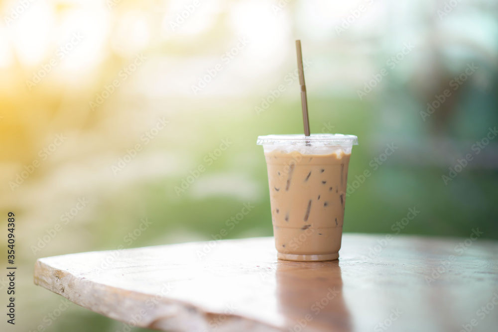 Iced coffee resting on the table background blurred Iced coffee resting on the table background blurred
