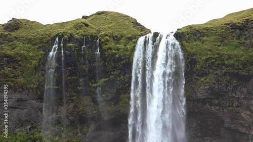 The most famoust Icelandic waterfall - Seljalandsfoss. photo