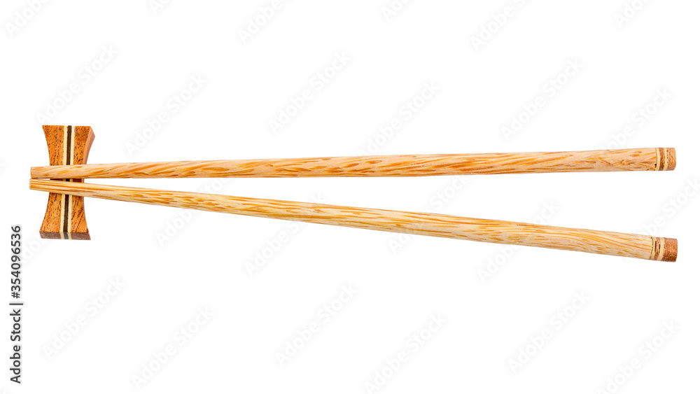 Top view of wooden chopsticks and chopsticks rest isolated on white background Top view of wooden chopsticks and chopsticks rest isolated on white background