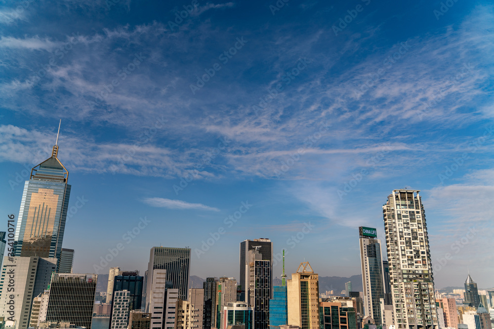 The amazing view of Hong-Kong cityscape full of skyscrapers from the rooftop.