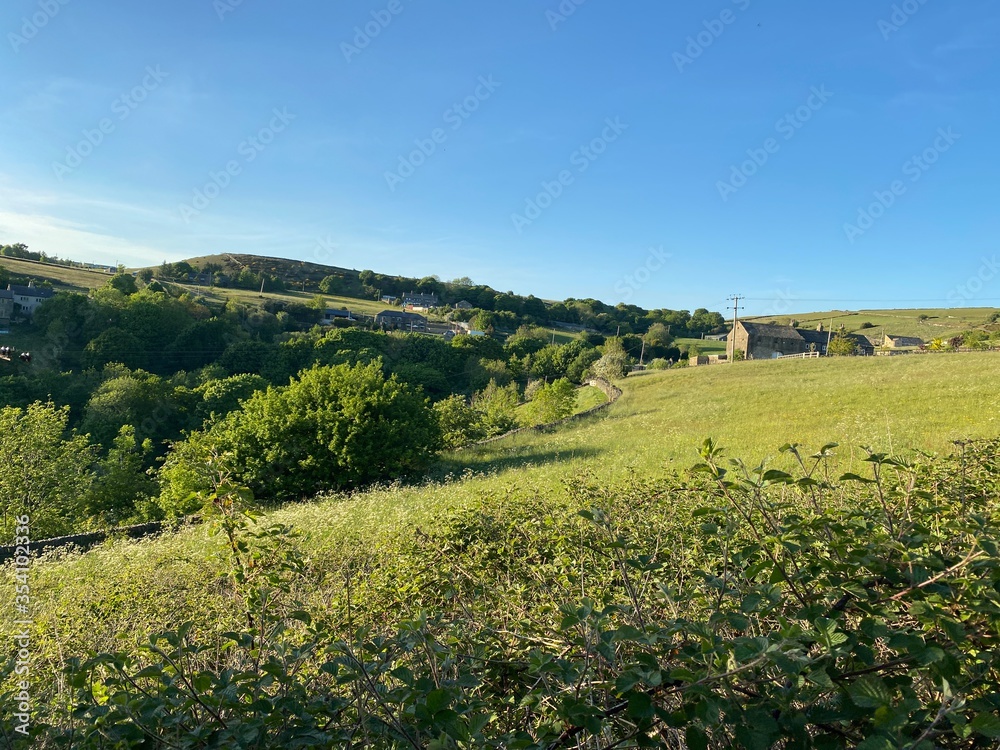 Rural scene with meadows and farm buildings in, Thornton, Yorkshire, UK Rural scene with meadows and farm buildings in, Thornton, Yorkshire, UK
