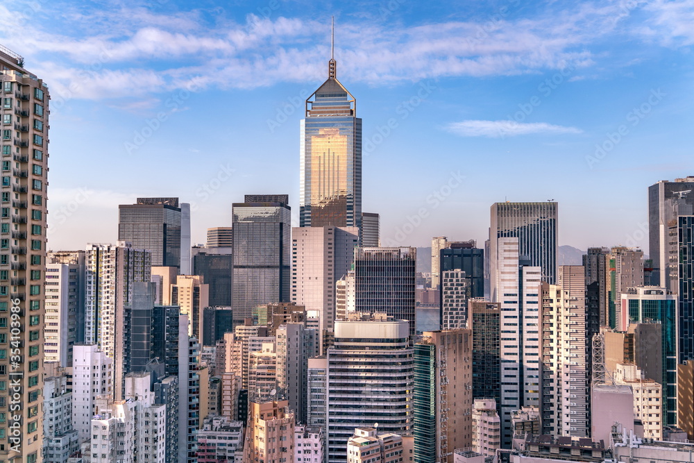 The amazing view of Hong-Kong cityscape full of skyscrapers from the rooftop.