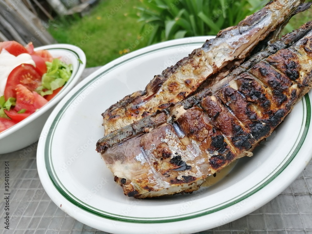 Grilled fish and salad Grilled fish and salad