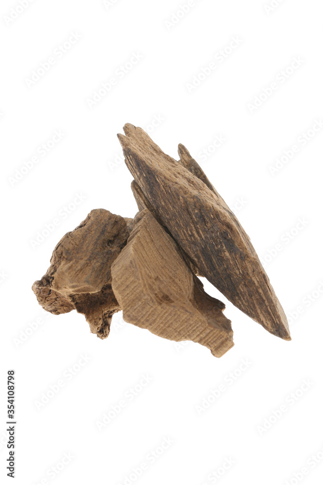 Fototapeta premium Selective Focus, Sticks Of Agar Wood Or Agarwood Background The Incense Chips Used By Burning for incense & perfumes of essential oil as Oud Or Bakhoor