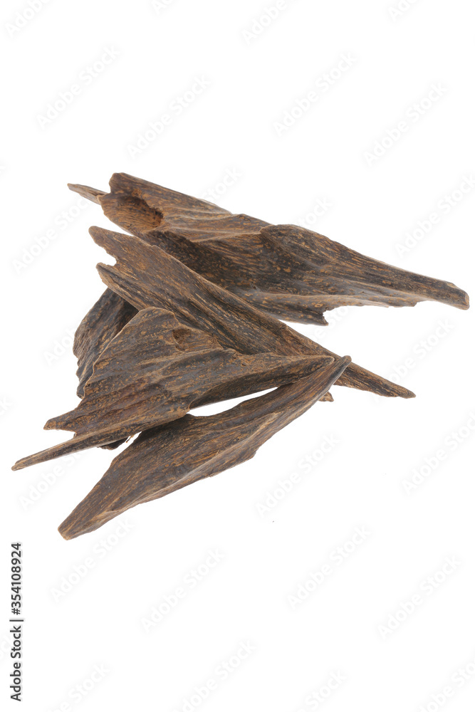 Fototapeta premium Selective Focus, Sticks Of Agar Wood Or Agarwood Background The Incense Chips Used By Burning for incense & perfumes of essential oil as Oud Or Bakhoor