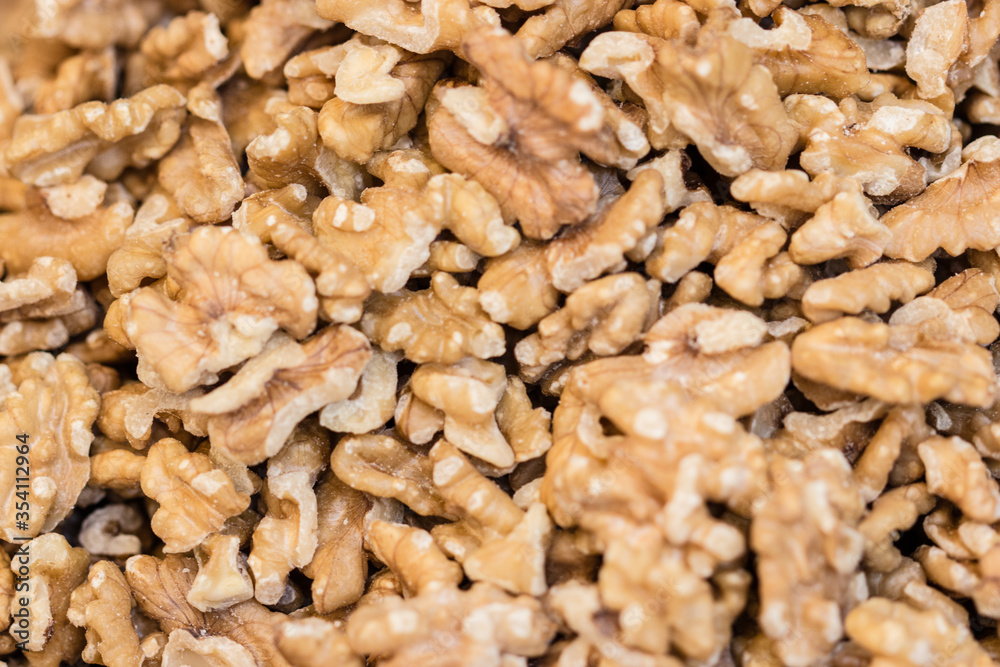 rich pile of tasty walnuts rich pile of tasty walnuts
