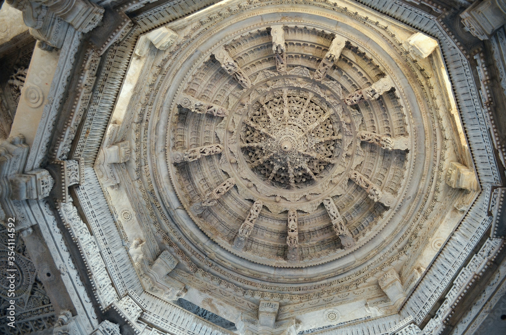 fragment of a carved white marble ceiling in Ranakpur temple, India
