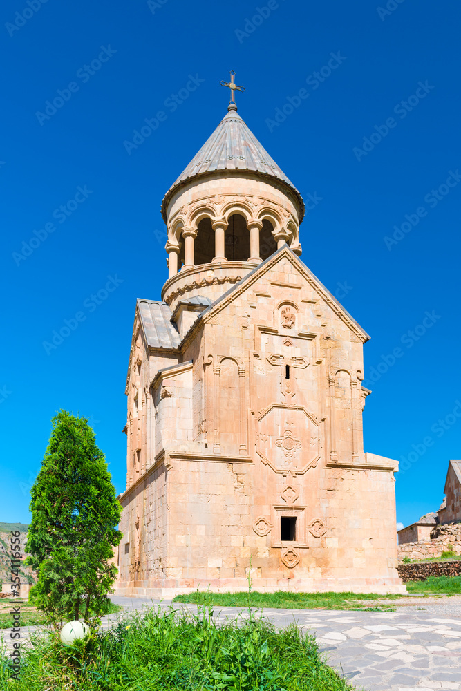 Temple with the bell tower of Noravank Monastery on a sunny summer day, a tourist attraction of Armenia
