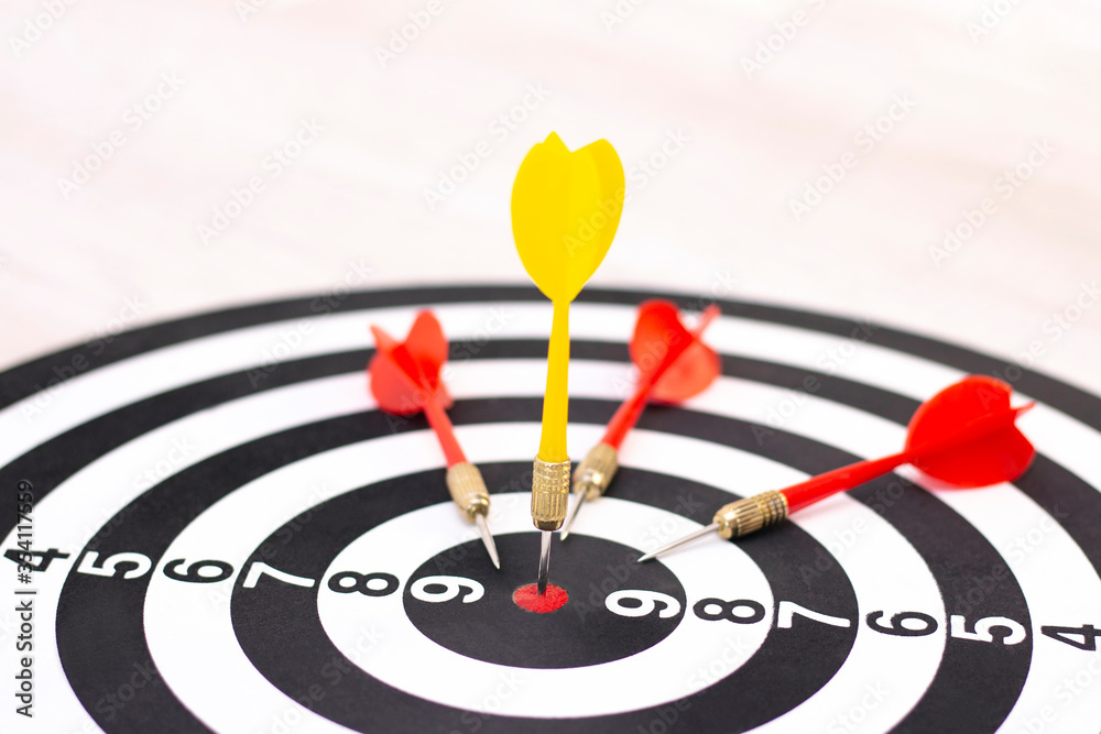 Right to Target Concept Using Darts in Bulseye on Darts Business Success Concept. destruction of competition. one arrow in bulseye, three red arrows fell Right to Target Concept Using Darts in Bulseye on Darts Business Success Concept. destruction of competition. one arrow in bulseye, three red arrows fell