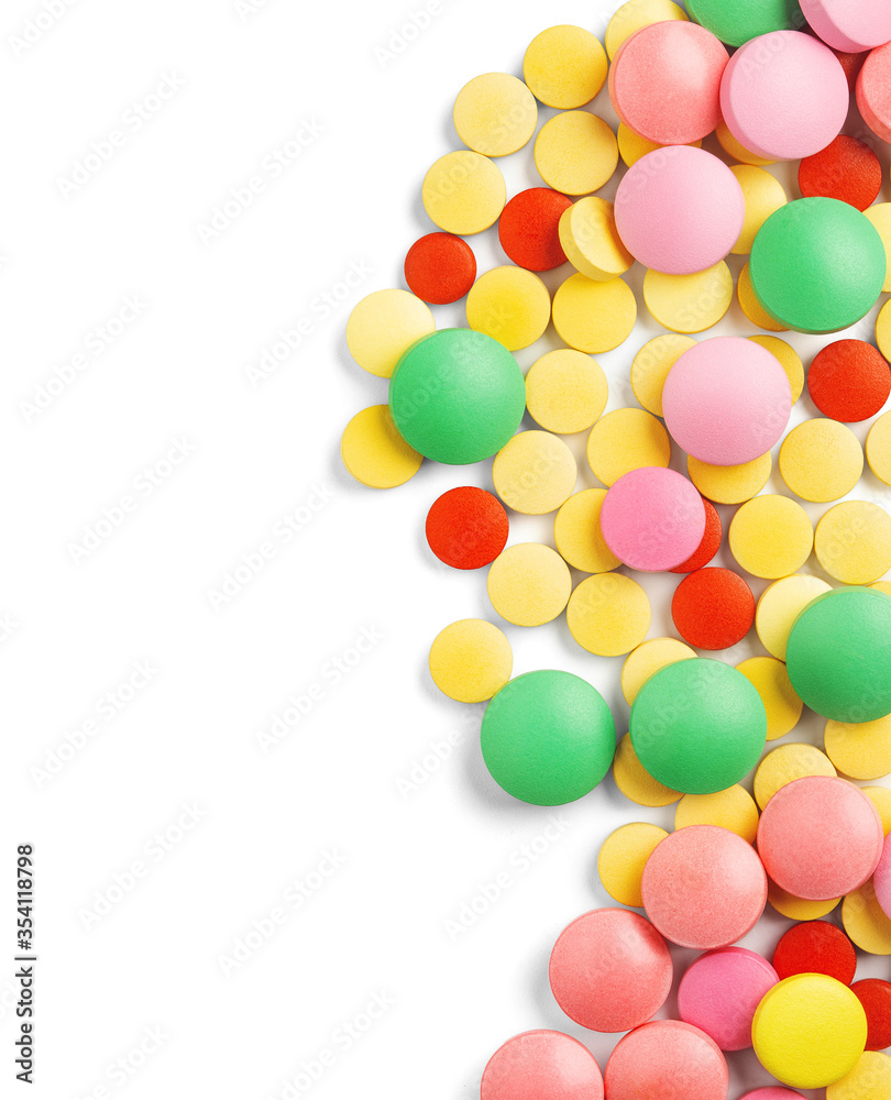 pile of medical pills on white background with place for text. Pattern for design.