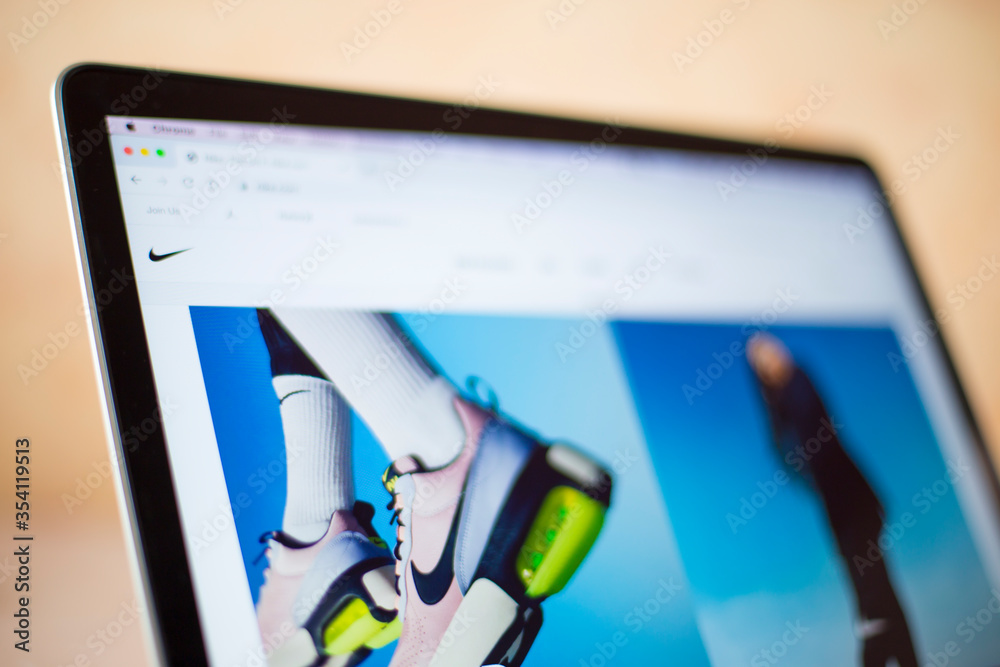 Nike web site on computer screen. It is an American multinational  corporation for design, development, manufacturing and sales footwear,  apparel, equipment, accessories, and services. foto de Stock | Adobe Stock
