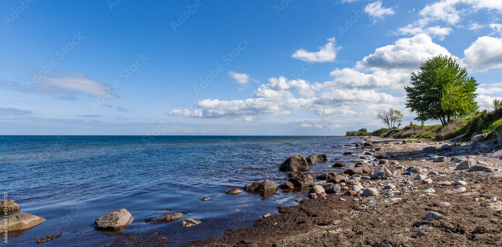 beach and blue sea water with blue sky and white clouds landscape 