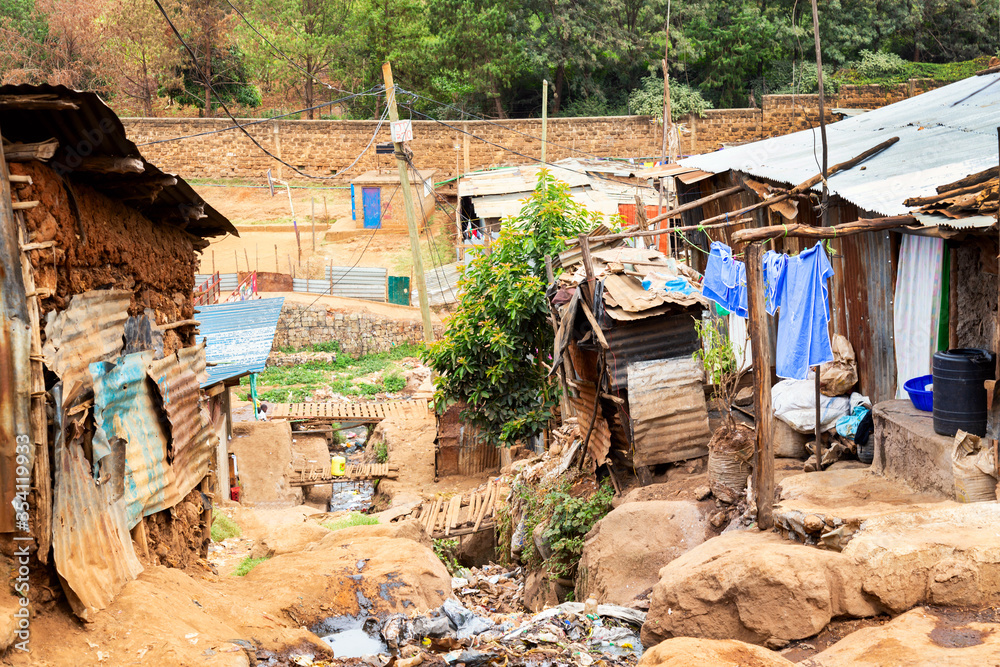 Kibera is the biggest slum in Africa. Slums in Nairobi, Kenya. - obrazy, fototapety, plakaty 