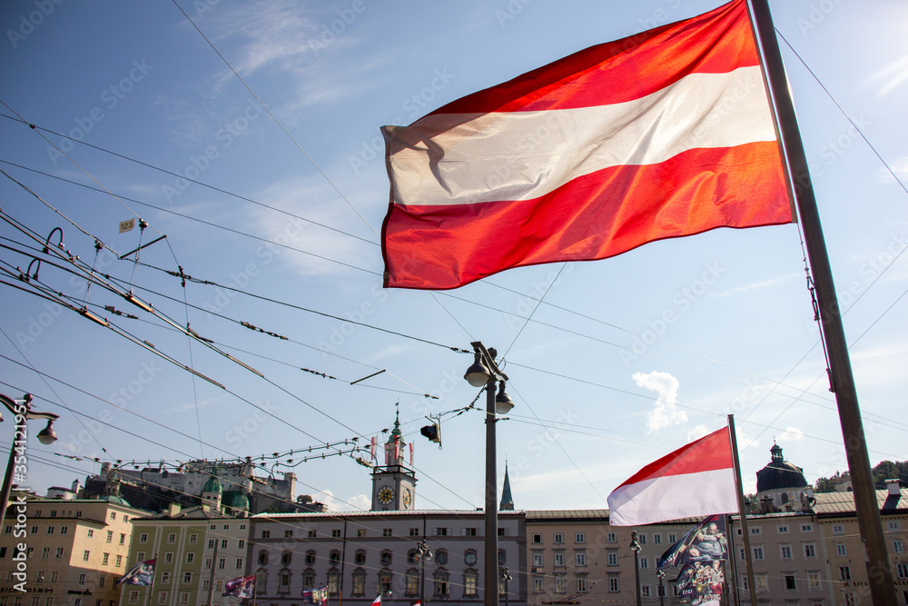 Austrian flag flying on sunny day
